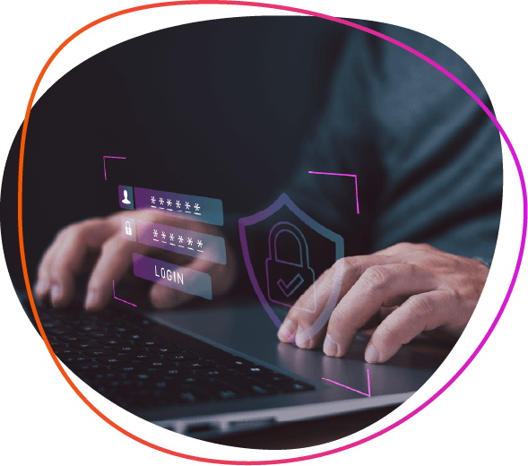 hands on laptop keyboard and security symbol hovering over