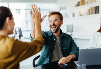 Business people celebrating success in an office