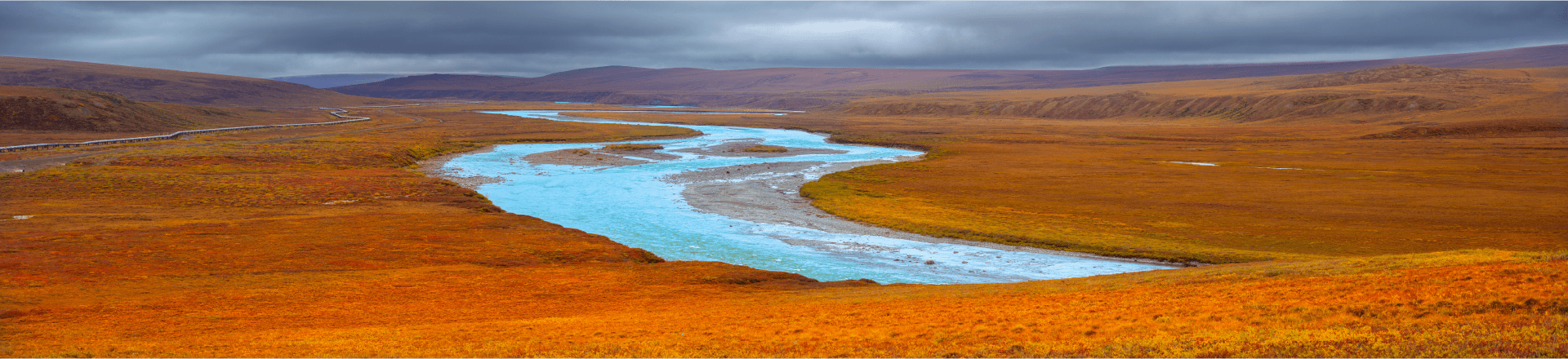 TAPS pipeline across autumn Alaskan landscape